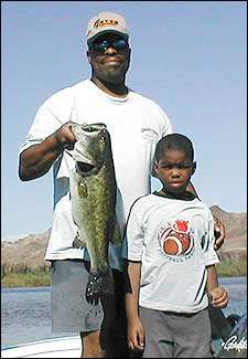 	<strong>Kwame K. Kuanda</strong>
<p>
	11 pounds, 2 ounces<br />
	July 15, 2004; 2:30 p.m.<br />
	Colorado River, CA<br />
	<b>Lure</b>: Yamamoto Crawdad (rootbeer)<br />
	<b>Depth</b>: 5 feet, cattails</p>
