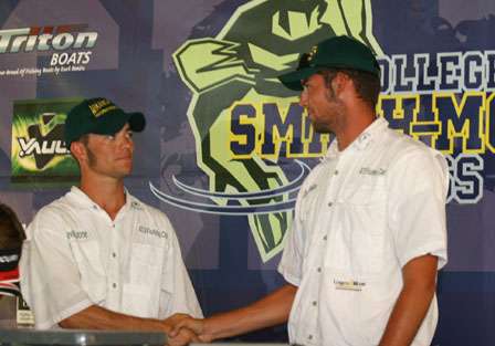 Ray Huddleston and Kevin Koone celebrate their victory with a handshake