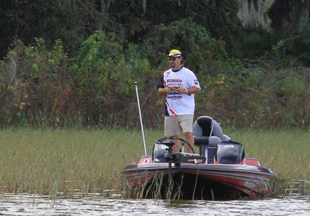 Angler Dave Johnson was sticking with the same pattern we had seen him on earlier in the week. He was flipping more sparse vegetation looking for feeding bass.