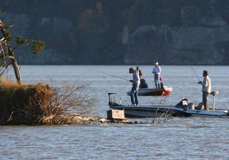 Second-flight competitors make a few casts late in the day around an island near the check-in.