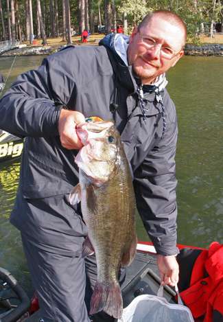 Non-boater Todd Sadler holds up a big Lake Guntersville largemouth he caught Friday.Non-boater Todd Sadler holds up a big Lake Guntersville largemouth he caught Friday.