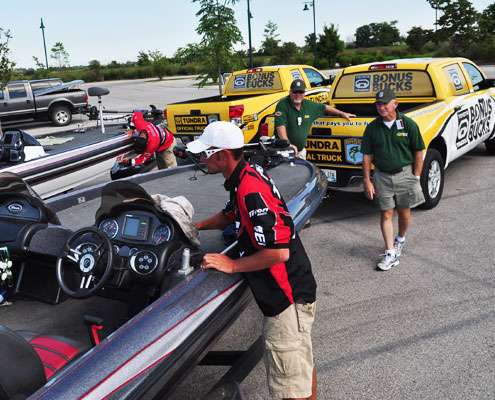 <p>
Kyle Kempkers washes his boat in the background.</p>