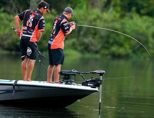 Flurry hooks up with a fish on a topwater bait.