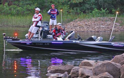 <p>
Prior to the take off, collegiate anglers wait for the morning to start.</p>