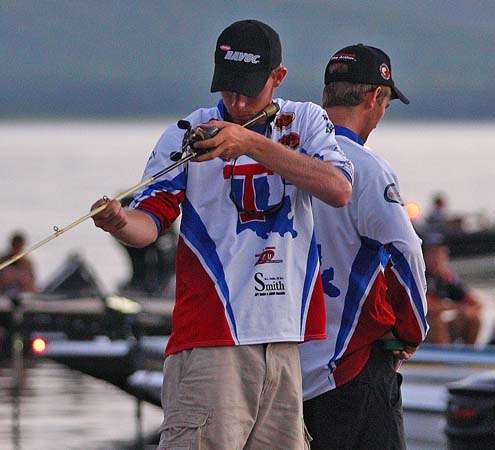 <p>
A Louisiana Tech angler adjusts his rods while waiting for the take off.</p>