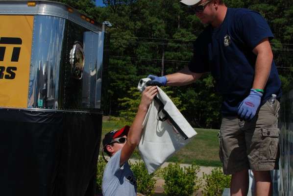 <p>
Once the bass were weighed they were put in a holding tank to be released back into Lake Maumelle.</p>