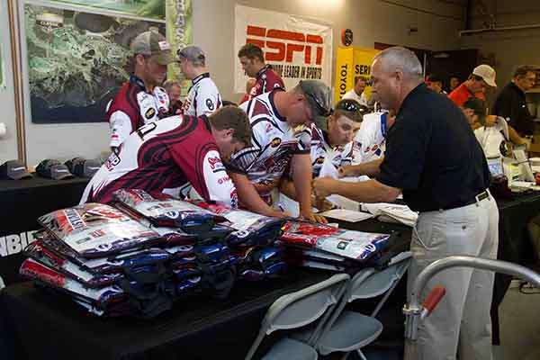 <p>
Anglers collect their Mustang Survival inflatable PFD.</p>