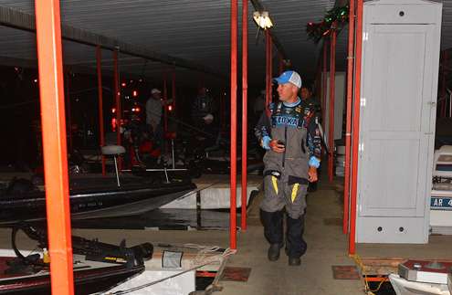 <p>Brent Chapman prepares to pull his boat from the water. </p>
