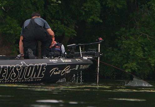 <p>Co-angler Brian Weshwanick moves to the bow of the boat to assist Crist in getting back in the boat. </p>