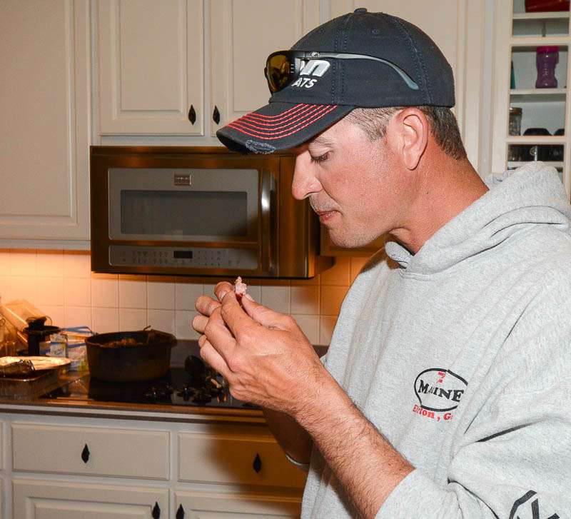 Casey Ashley tries out Terry's special rib recipe.