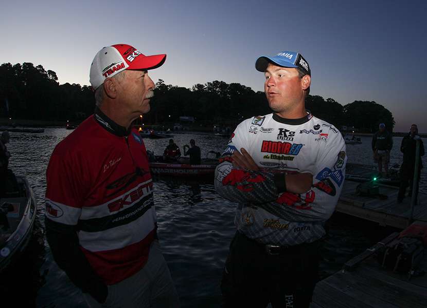 Cajun Baby Cliff Crochet talks with the Skeeter support staff on the dock.