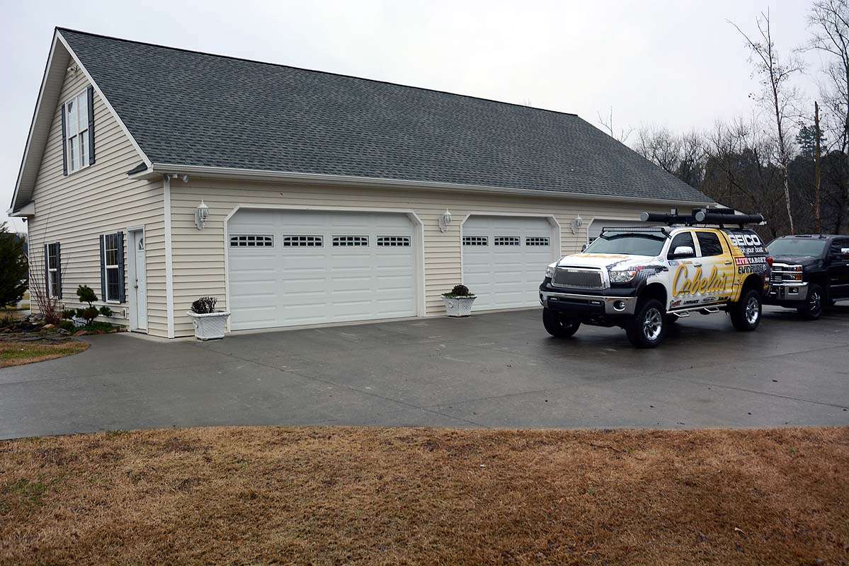 What looks like a garage in a suburban neighborhood is really something else. Welcome to Bassmaster Elite Series pro David Walkerâs man cave. The building is nearly the size of his spacious 2,400-square-foot home located next door. 