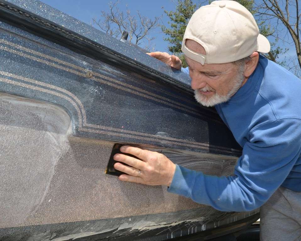 Since my hull was UV weathered and rough to the touch, I first sanded it with 600-grit wet or dry sandpaper. I followed up with 1,000-grit.