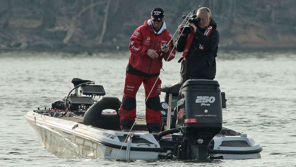 The fish comes to the rear of the boat.