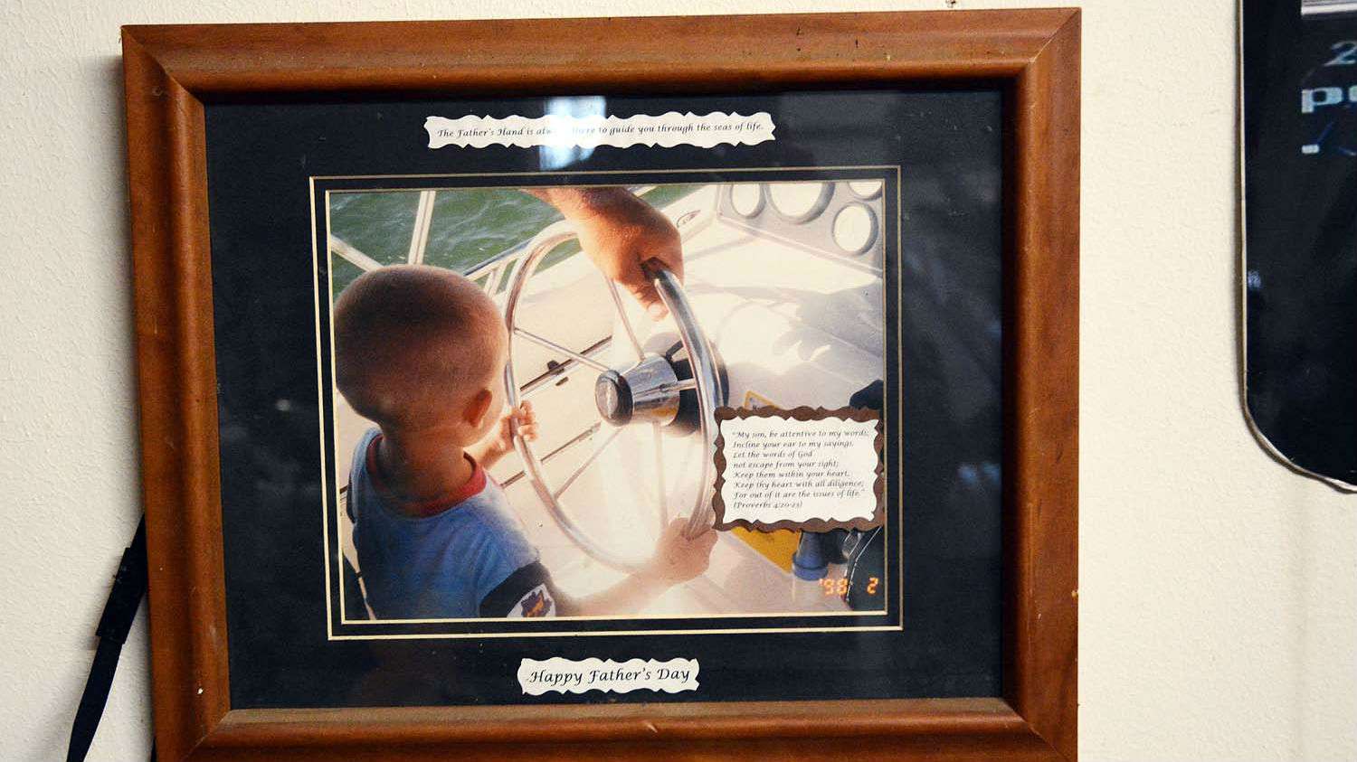 âThe Fatherâs Hand is always there to guide you through the seas of life.â Thatâs the quote on this framed picture given to Chris by wife Holly. She wrote the headline and with Proverbs 4:20-23 for the inscription. The hand belongs to Chris with his oldest son Cal sharing the wheel of their boat. 