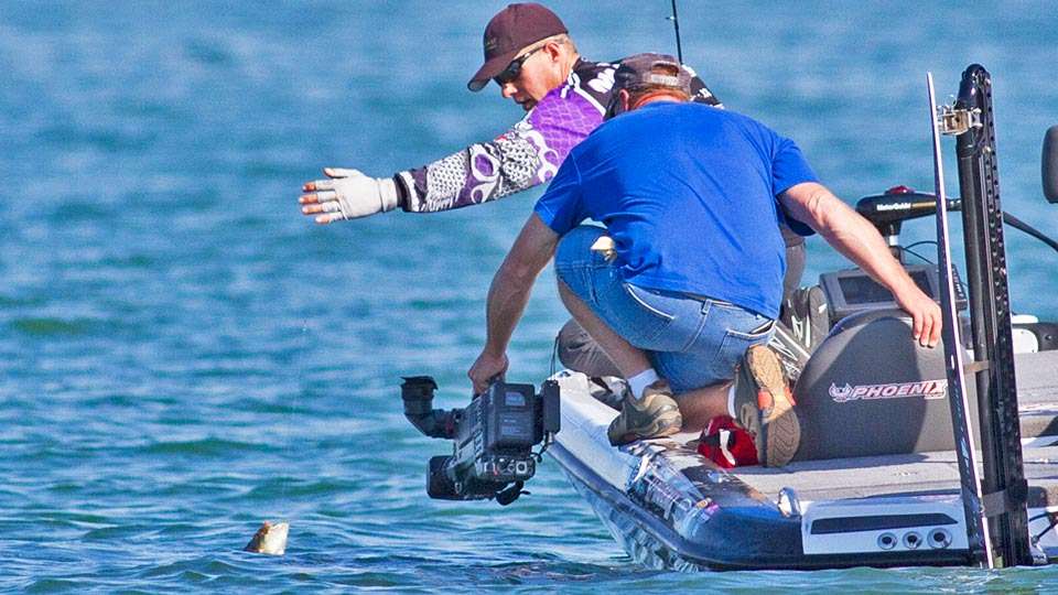 Even if it meant hanging off the side of a boat to get the whole picture.