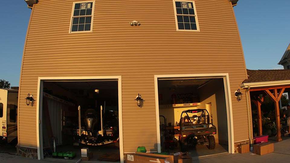 The left bay is long enough and tall enough to accommodate Ikeâs truck and boat. Ike has a 6-inch lift on the truck and has a kayak on top, so the ceiling is Ike-sized. 