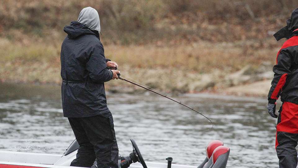 He goes to the console as he prepares to land his 7th fish of the day.