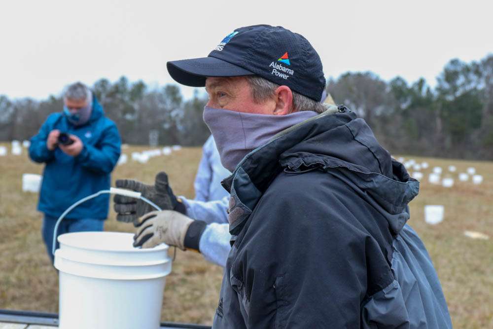 Alabama Power's Mike Clelland observes the progress. 