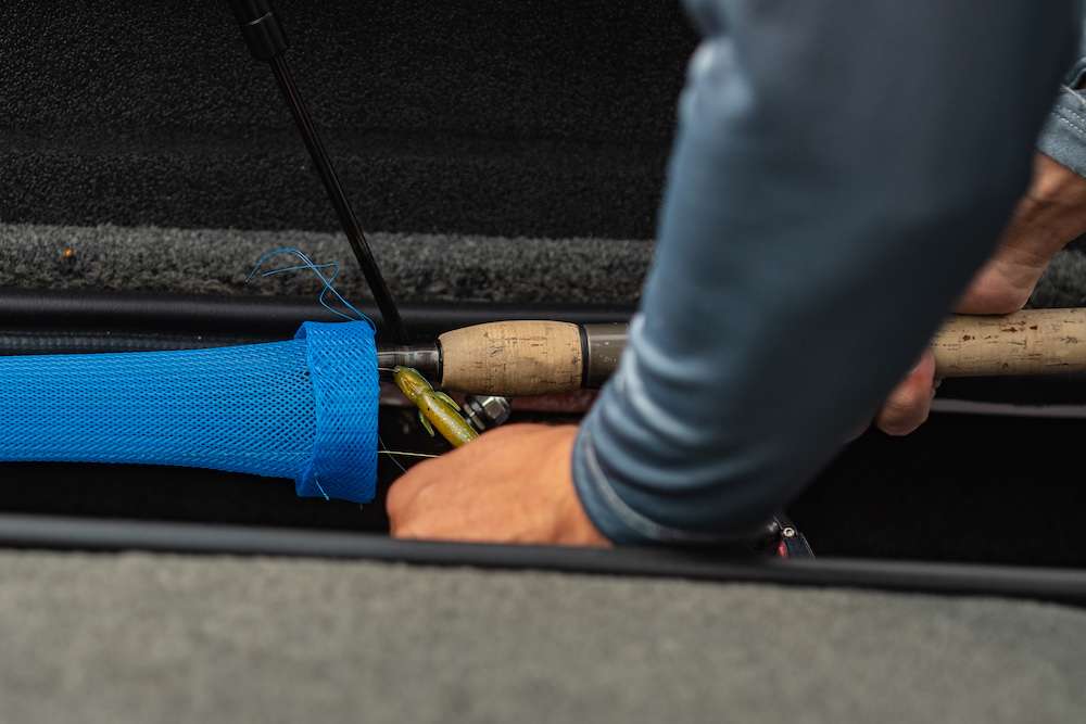 That rod's done; no changes made. Downey stows it on the right side of the boat and continues his preparation. But first, the rest of his office!